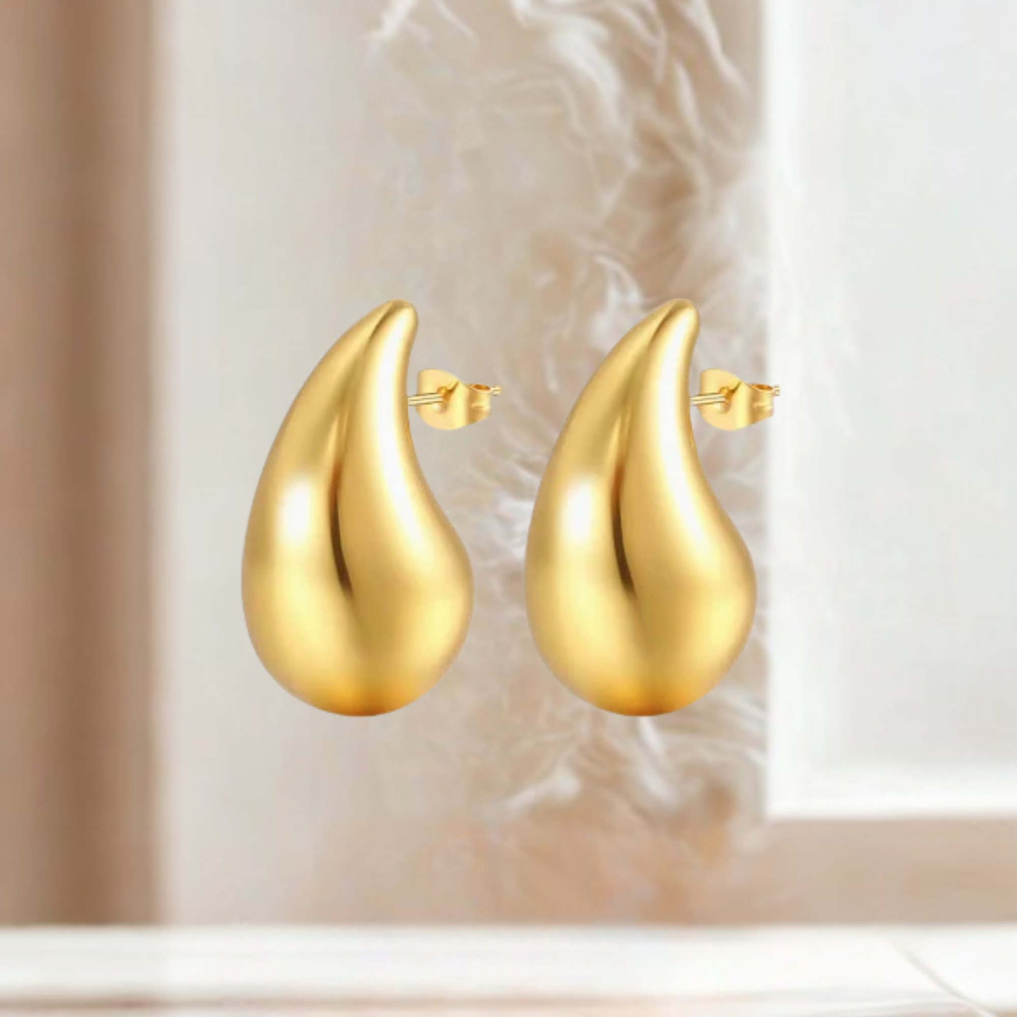 Tear drop earrings mat gold